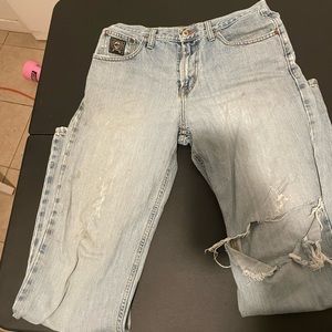 Heavily worn mens cinch 31x36 black label jeans
